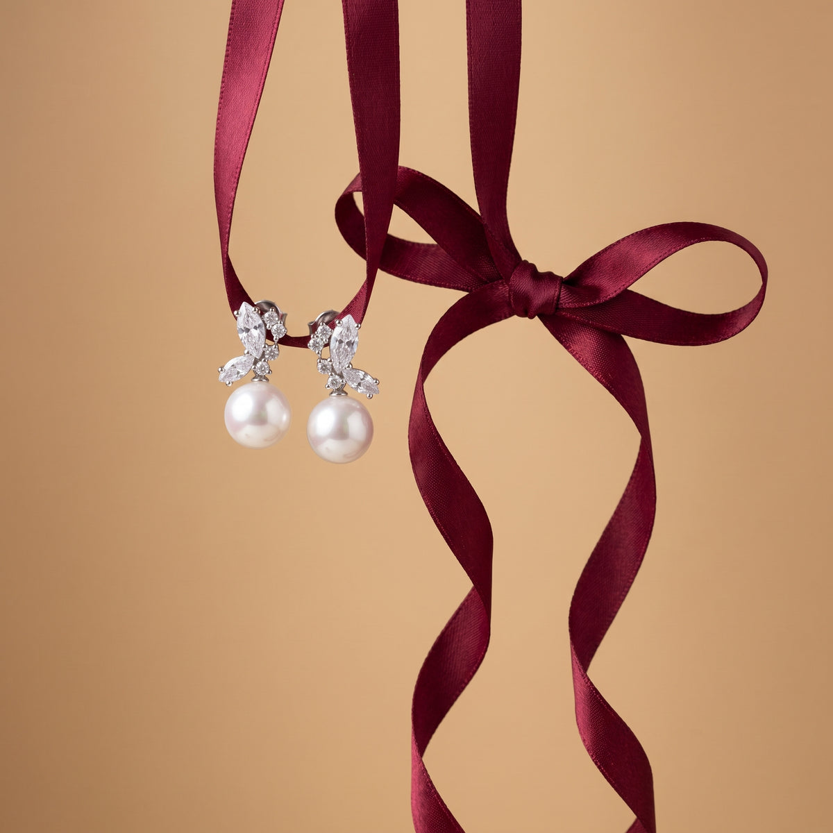 Bow Sparkle Pearl Drop Earrings