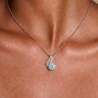 Round Wire Cage Pendant Necklace close-up on model - NyuMe